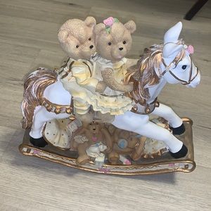 Beautiful decorative intricate rocking horse for baby’s room. Great condition.